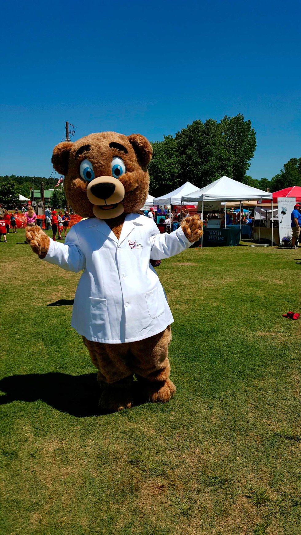 The Carroll Pharmacy Caring Bear mascot